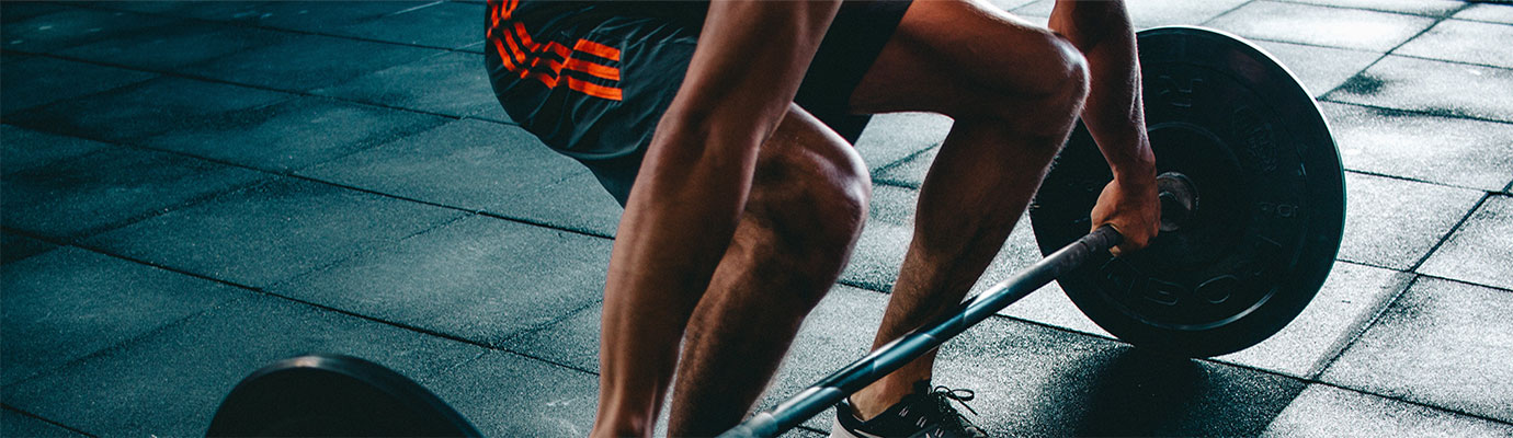 cbd-arthritis-blog-4 Weightlifter taking CBD tincture to help with arthritis pain in his knees