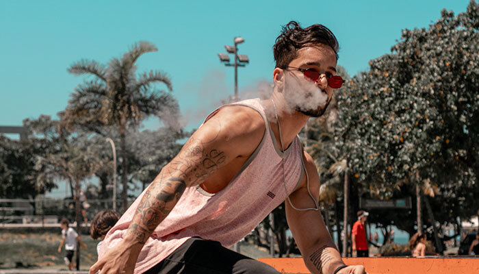 delta-8-vape-pens-pittsboro-indiana-buy-thc-carts-46167 Man skateboarding while using Delta 8 vape pen near Pittsboro, Indiana from Simple Garden CBD